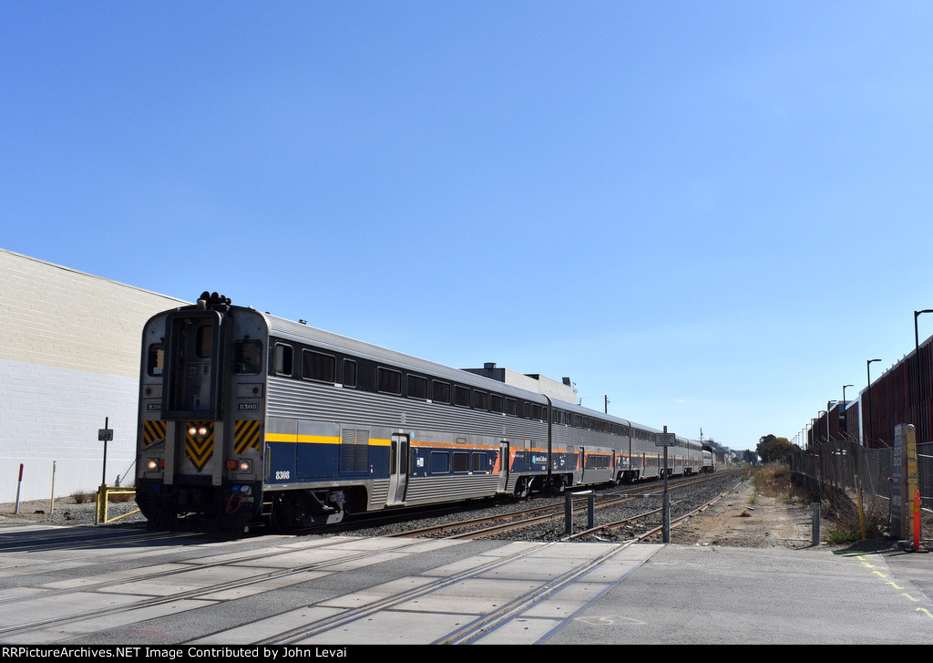 Amtrak San Joaquin Train # 716 about to bypass the Berkeley depot with California Cab Control Car in the lead 